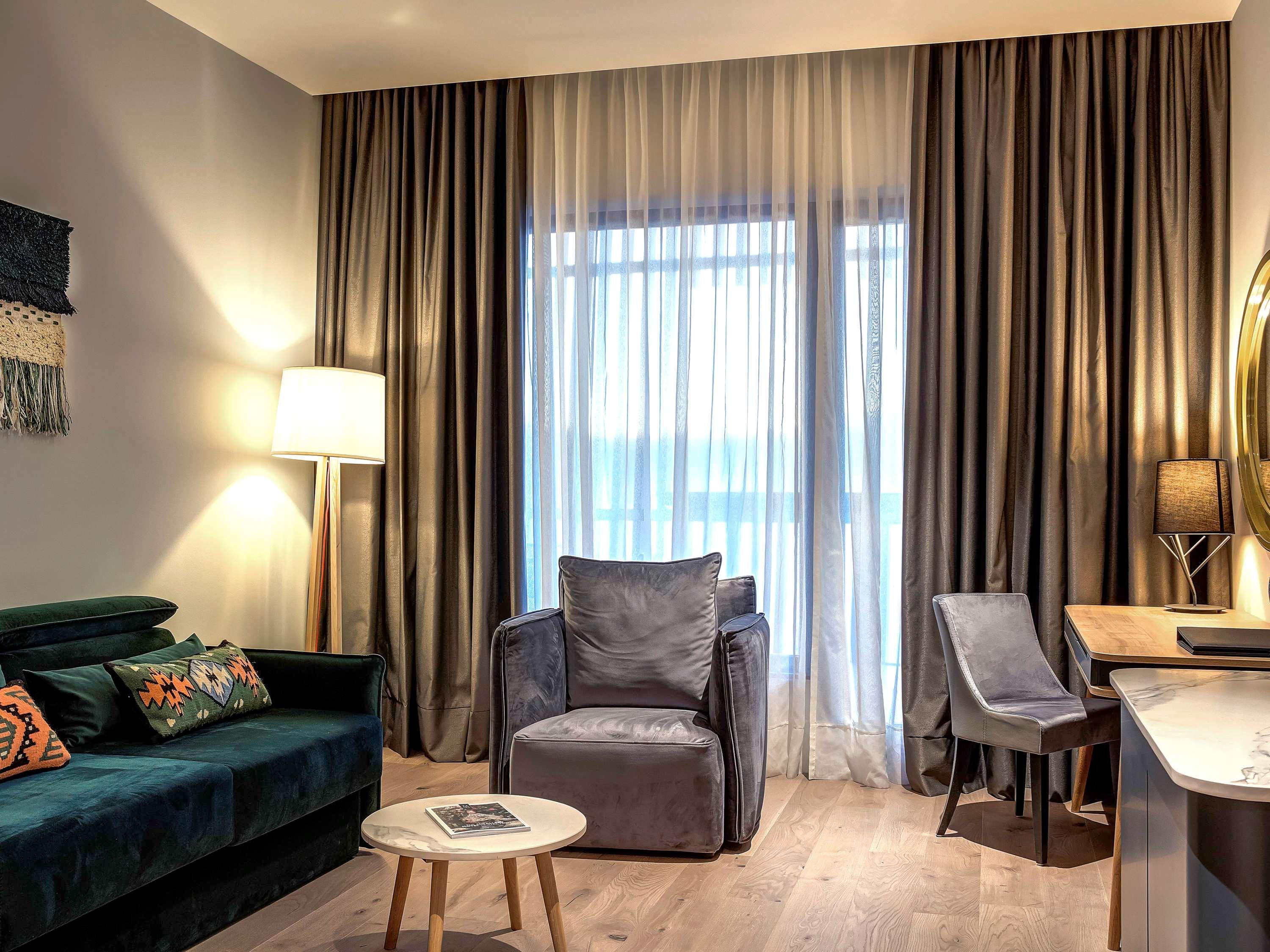 Tarcin Forest Resort & Spa Sarajevo - Mgallery Collection מראה חיצוני תמונה A living room in a hotel